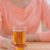 Young beautiful  woman with glass of juice